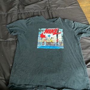 Worn black Nike workout shirt. Basketball